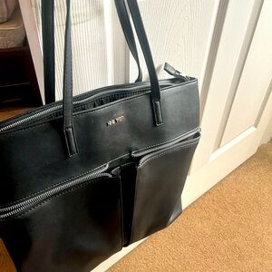 Nine West Tote . Carry a lot of your office and things  casually. 15by11inches